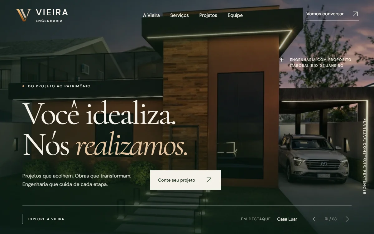 Página inicial da Vieira Engenharia, com uma casa contemporânea ao fundo e o título Você idealiza. Nós realizamos.